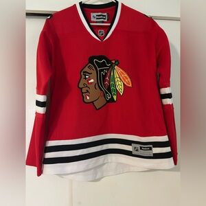 Women’s Reebok Chicago Blackhawks Jersey size Medium. Number 10 Sharp on back